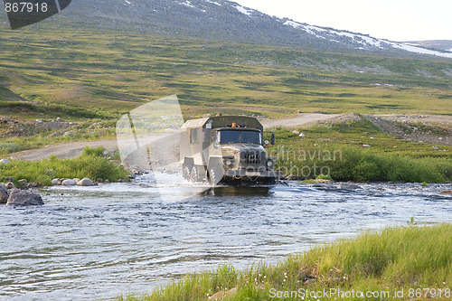 Image of Truck crossing a river