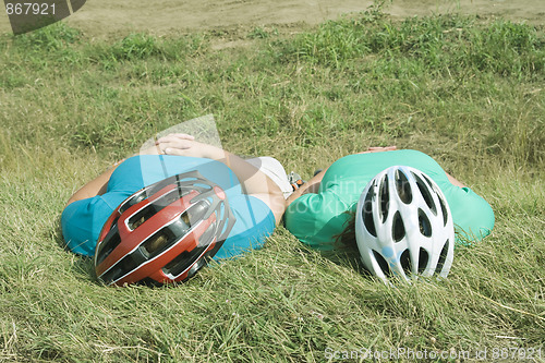 Image of Two cyclists resting