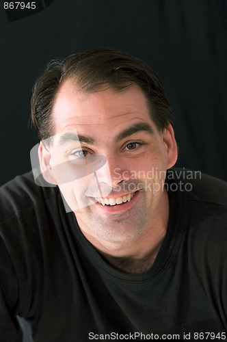 Image of smiling happy man with big grin
