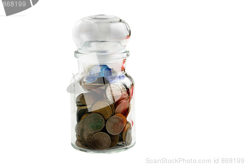 Image of old coins in old bottle