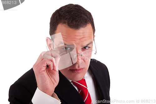Image of man putting on the glasses