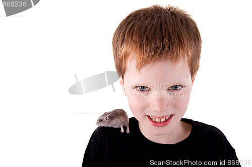 Image of Cute boy with hamster on shoulder
