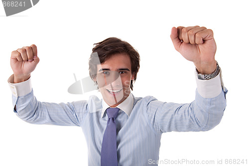 Image of Portrait of a very happy  businessman with his arms raised