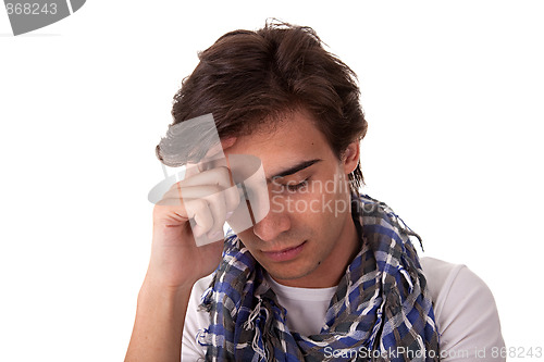 Image of Portrait of a handsome young man thinking,