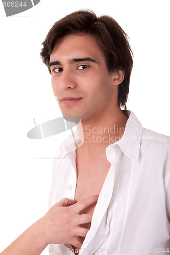 Image of hand of a woman inside the shirt of a handsome young businessman