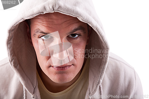 Image of man looking to camera with a hood