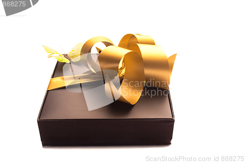 Image of gift with gold ribbon