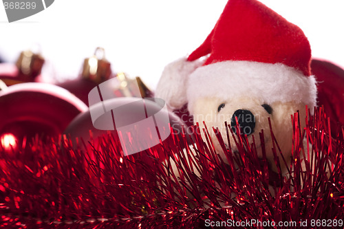 Image of Christmas: balls, ribbons and teddy bear