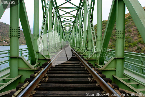 Image of rail train on a bridge