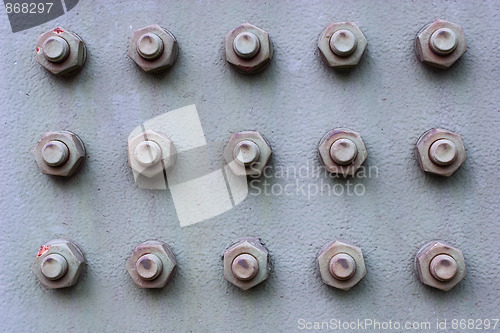 Image of Nuts And Bolts On Iron Plate