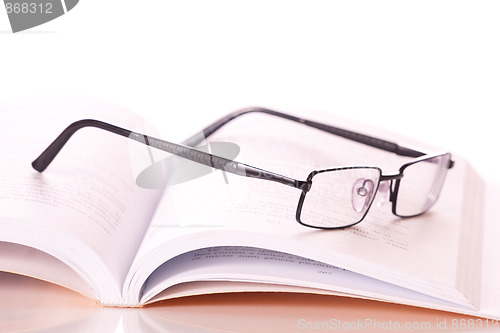 Image of glasses on a book