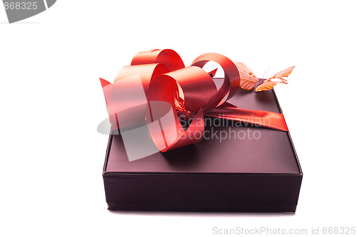 Image of gift with red ribbon