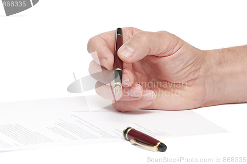 Image of signing a document