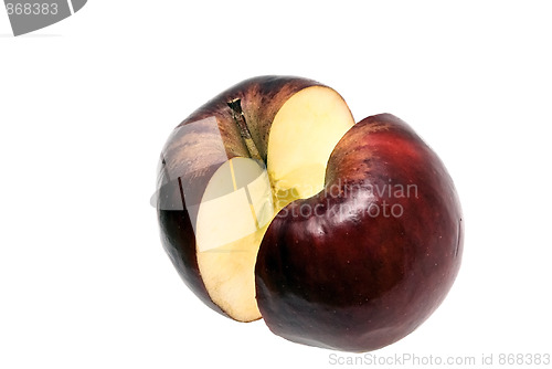 Image of split red apple on white