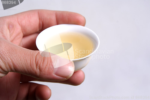 Image of Holding a cup
