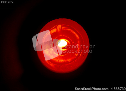 Image of Candles burning in the dark
