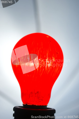 Image of red light bulb isolated