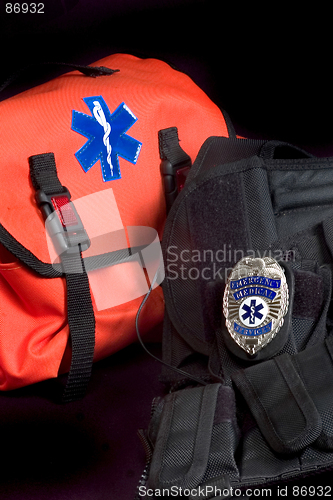 Image of EMT medical bag with Life Star, tactical vest and EMS shield badge