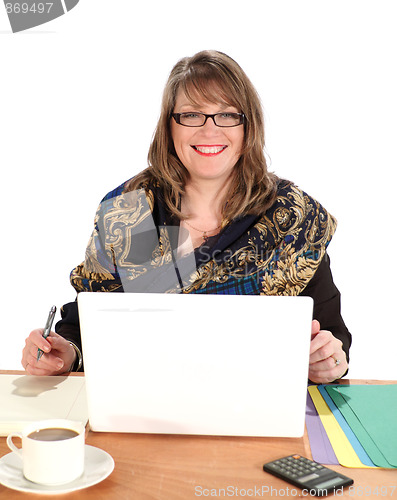 Image of Businesswoman Seated With Laptop