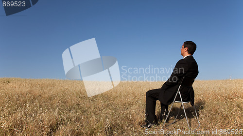 Image of Businessman waiting at the field