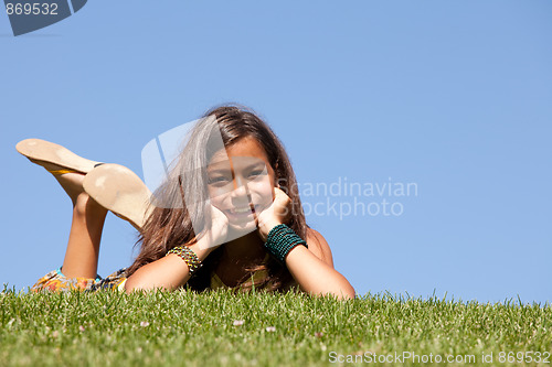 Image of young child on the grass