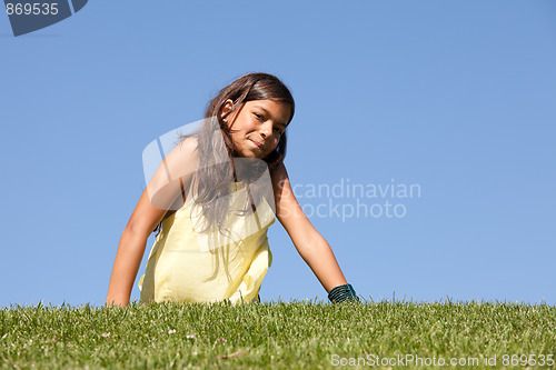Image of young child on the grass