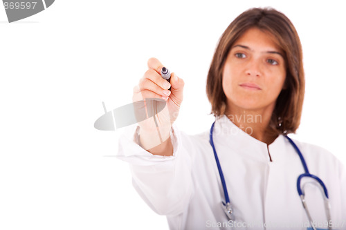 Image of Female doctor writing at the whiteboard