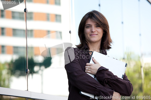 Image of Businesswoman working outdoor