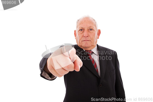 Image of senior businessman pointing