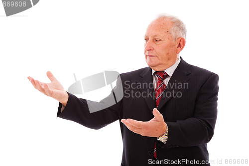 Image of Businessman showing something