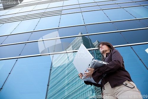 Image of Businesswoman working outdoor