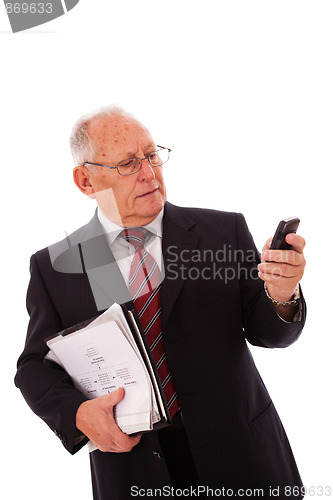 Image of Senior businessman call