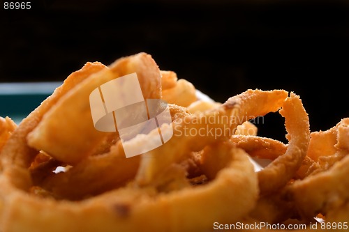 Image of Close up on Onion Rings with Black Background