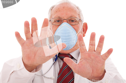 Image of Senior doctor with a mask