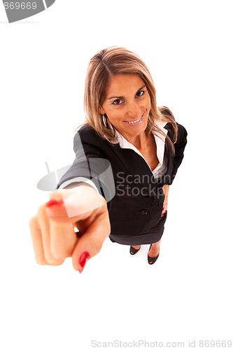 Image of Happy businesswoman pointing