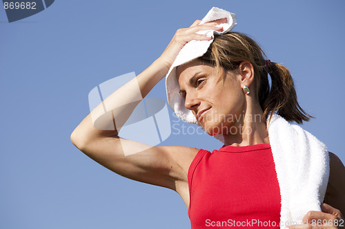 Image of sport woman with a towel