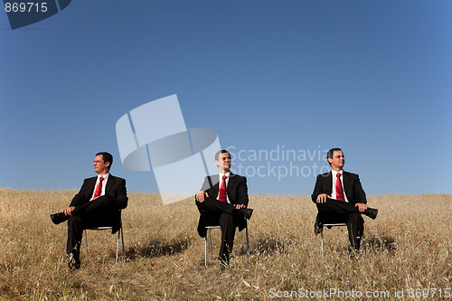 Image of Three businessman at the field