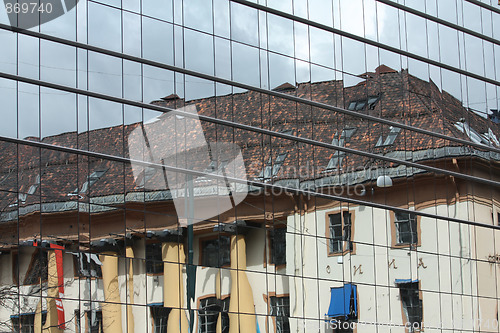 Image of Old building in modern glasses