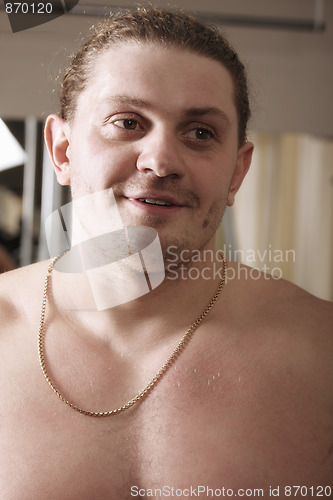 Image of Strong guy with gold chain