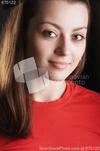 Image of Young brunette in red