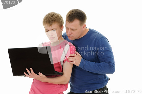 Image of  father and  son with laptop