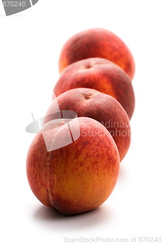 Image of four peaches