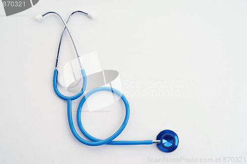 Image of blue stethoscope on white