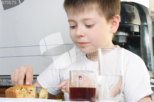 Image of Boy eating apple pie