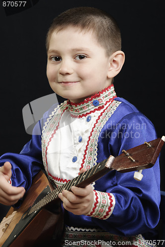 Image of Little boy with balalaika