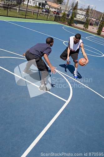 Image of Guys Playing Basketball