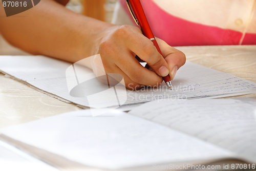 Image of Schoolgirl doing her homework