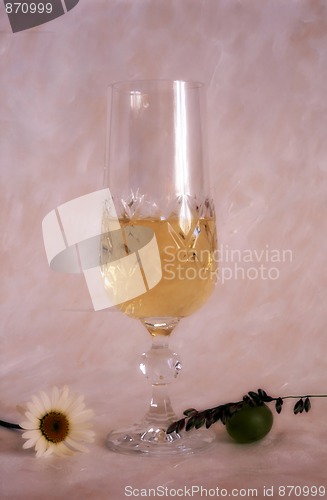 Image of A glass of white wine on painted background