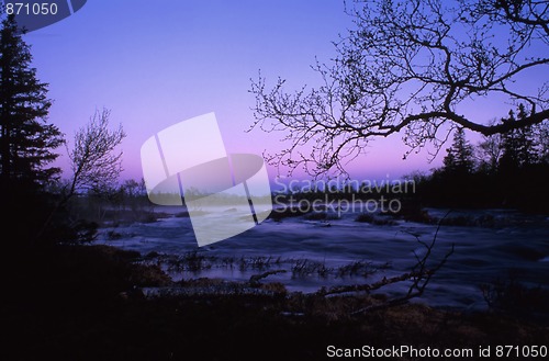 Image of sunrise / sunset in mountain lake