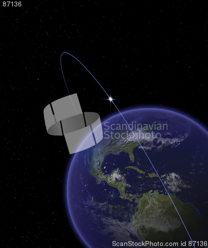 Image of Earth from space with satellite in orbit